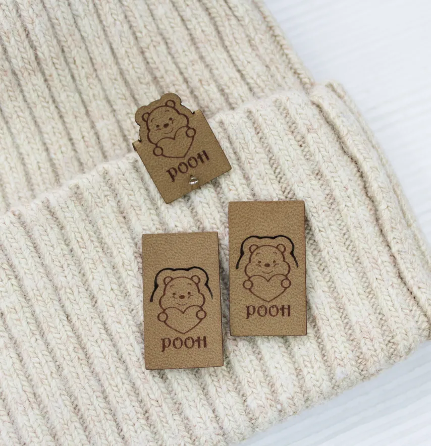 Нашивка "Pooh" 20*35 мм пісочного кольору-1