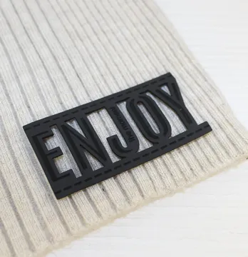 Нашивка "Enjoy" 60*30 мм чорного кольору