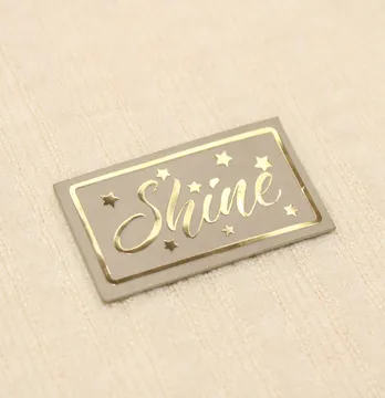 Нашивка "Shine" 25*42мм золотого цвета