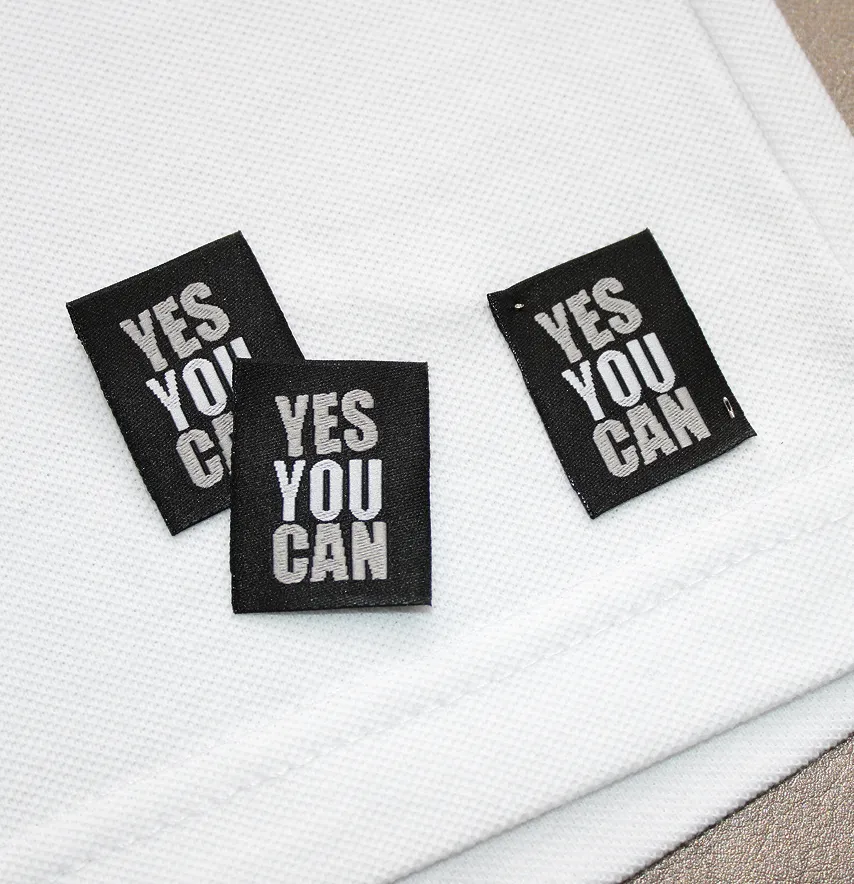 Бирка жаккардовая "Yes you can" 25*30 мм черного цвета-1