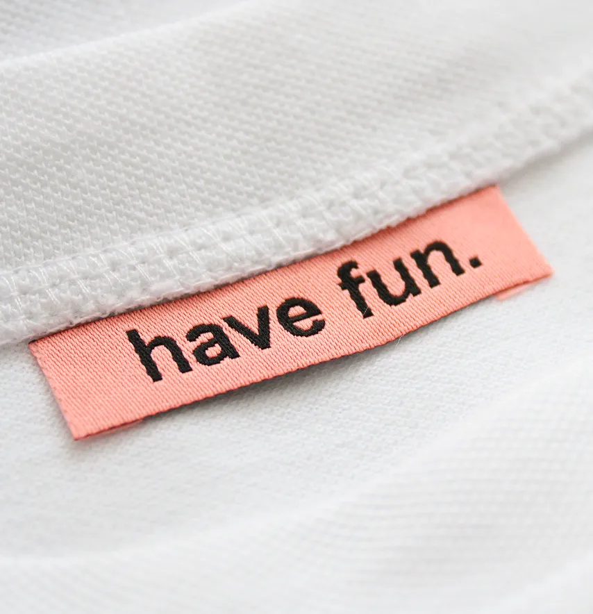 Бирка жаккардовая "Have fun" 50*12 мм персикового цвета с черным лого.-3