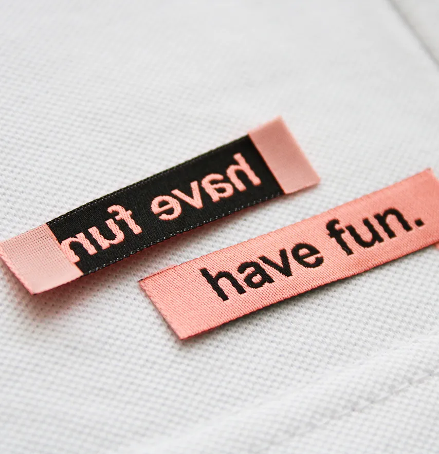 Бирка жаккардовая "Have fun" 50*12 мм персикового цвета с черным лого.-4