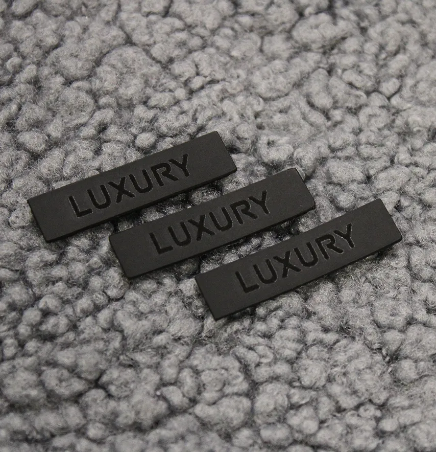 Нашивка "Luxury" 40*10 мм чорного кольору-1