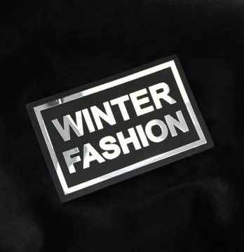 Нашивка "Winter fashion" 70*45мм черного цвета с серебряной надписью