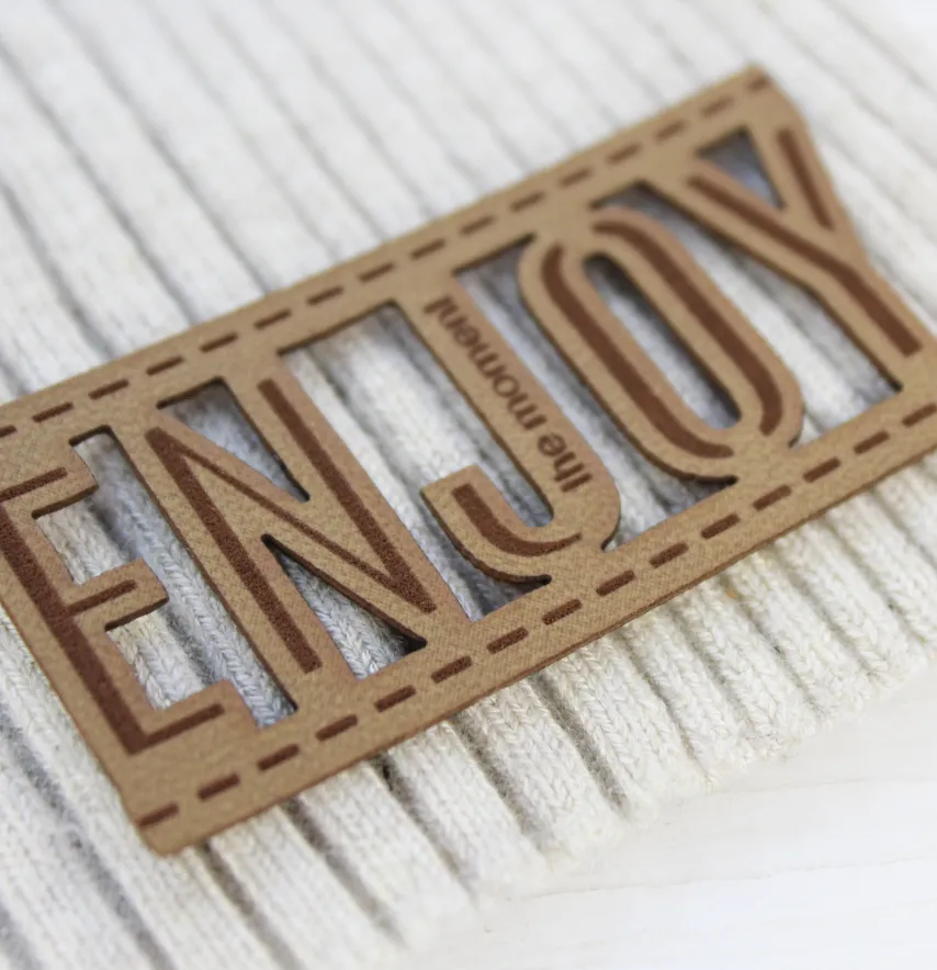 Нашивка "Enjoy" 60*30 мм пісочного кольору-0