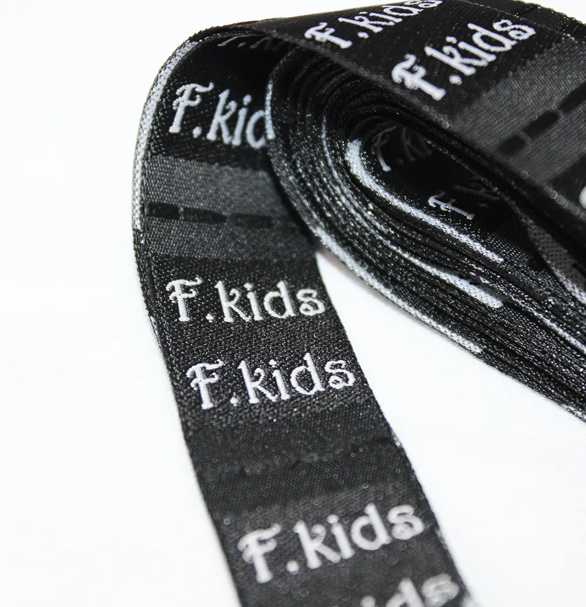 Бирка жаккардовая "F.kids" 20*32 мм черного цвета (шт)-2