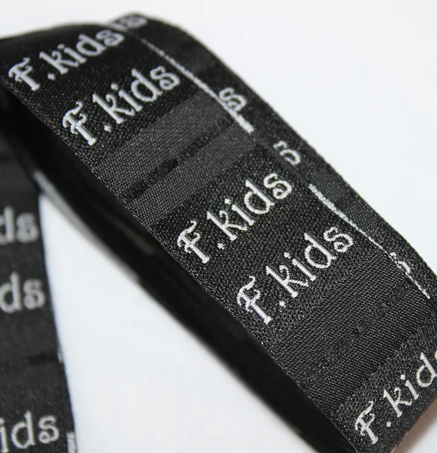 Бирка жаккардовая "F.kids" 20*32 мм черного цвета (шт)-3