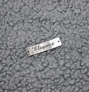 Нашивка "Elegance" 40*10 мм срібного кольору
