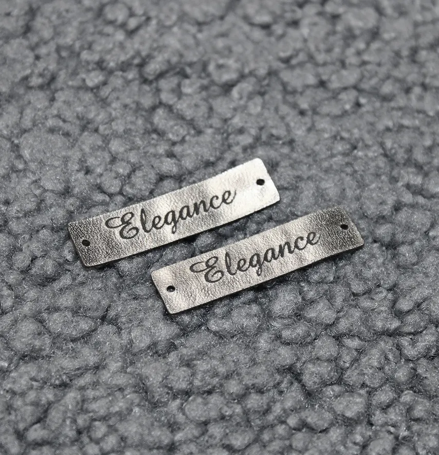 Нашивка "Elegance" 40*10 мм серебряного цвета-1