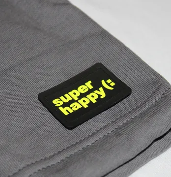 Нашивка "Super happy" 45*30 мм чорного кольору