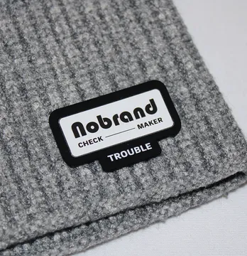 Нашивка "Nobrand" 40*25 мм чорного кольору з білим принтом
