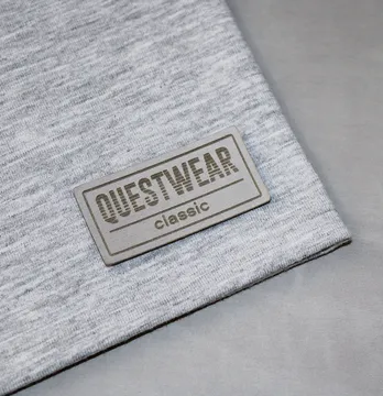 Нашивка "Questwear" 50*25 мм сірого кольору